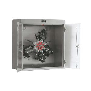 Masku žāvētājs ar metāla korpusu, atverama durvīm un rotējošām žāvēšanas ierīcēm iekšpusē.